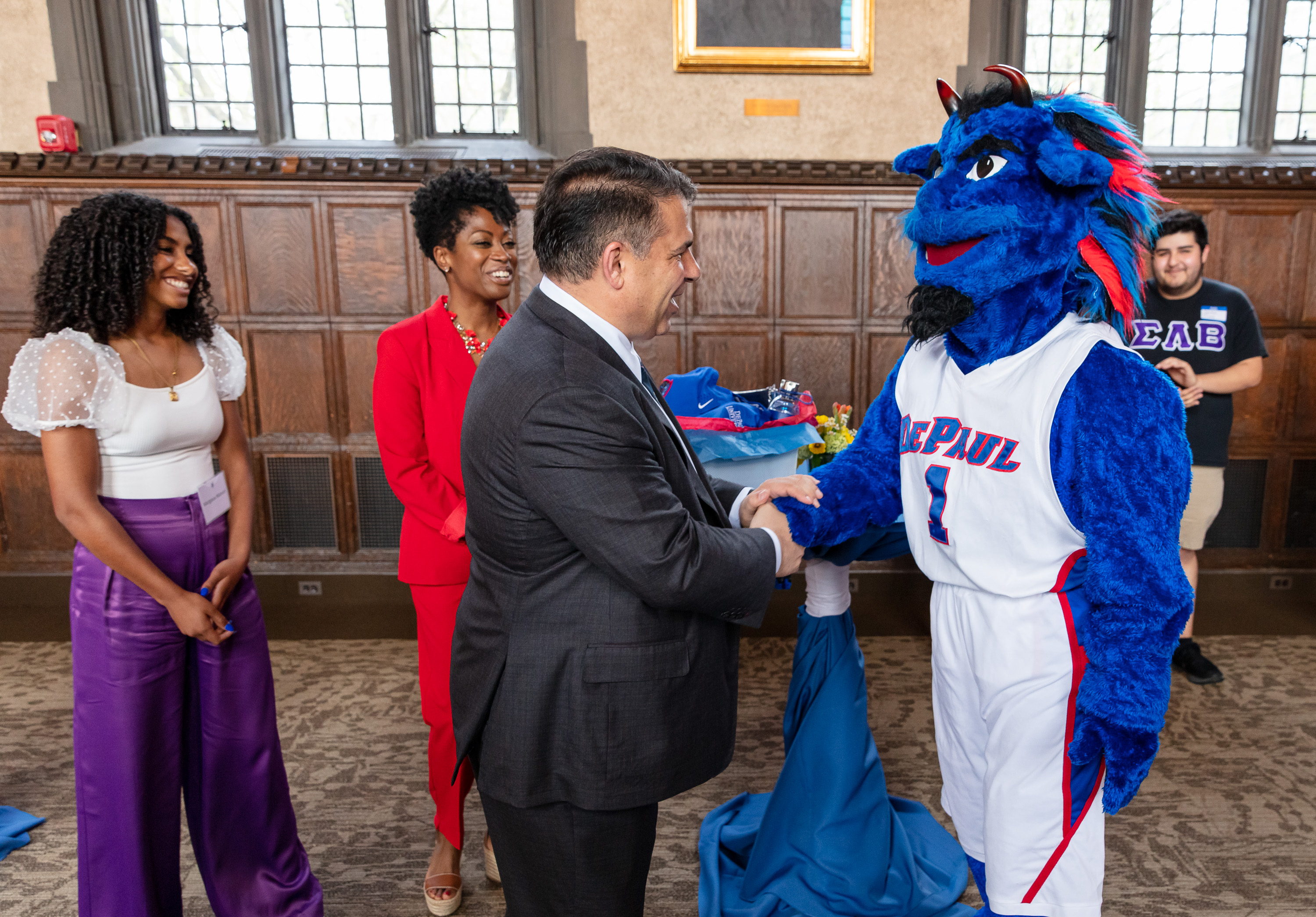 During an afternoon reception, DIBS presented the newest Blue Demons with small gifts, inducting them into the DePaul family. (DePaul University/Randall Spriggs)